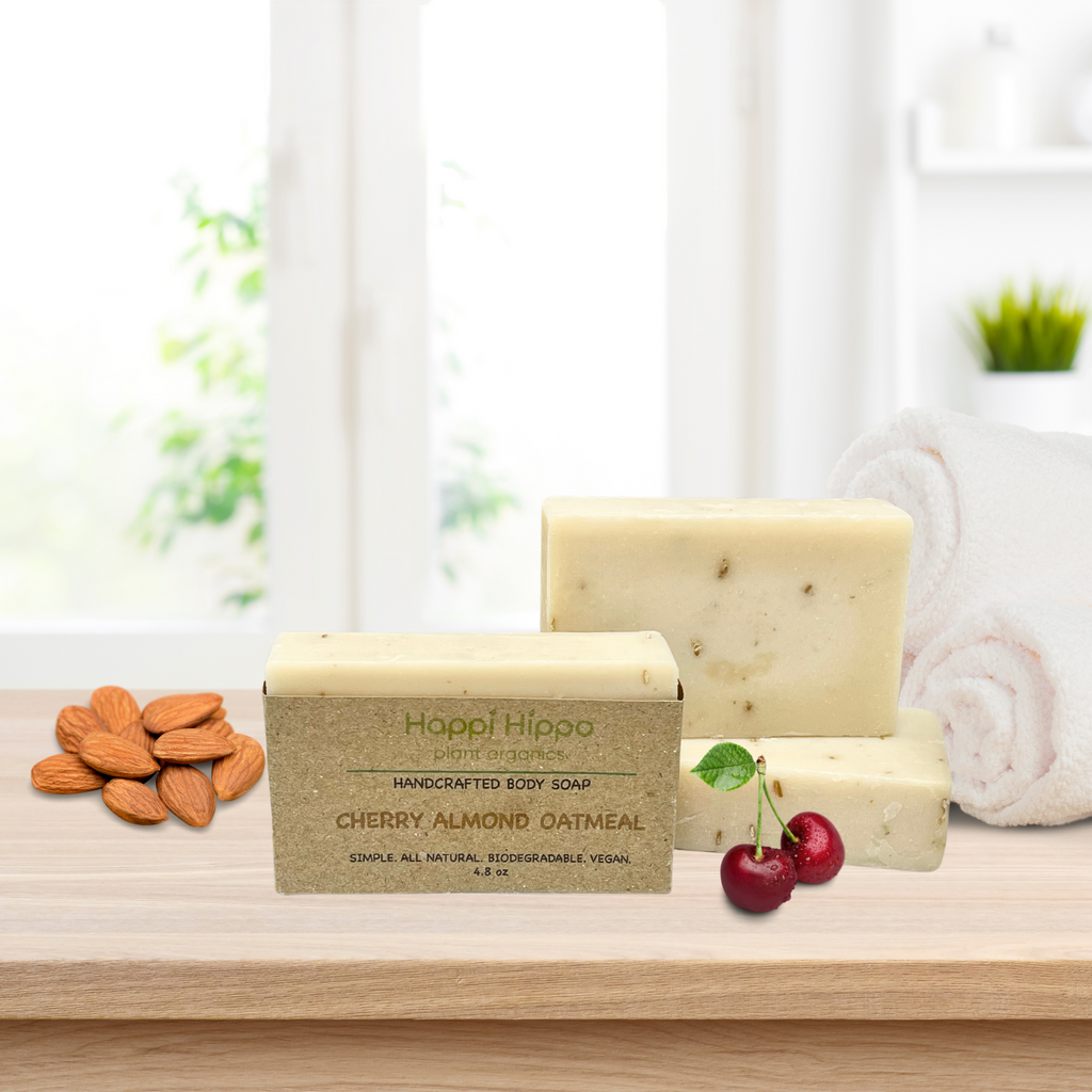 Cherry almond oatmeal soap displayed on wooden counter. 